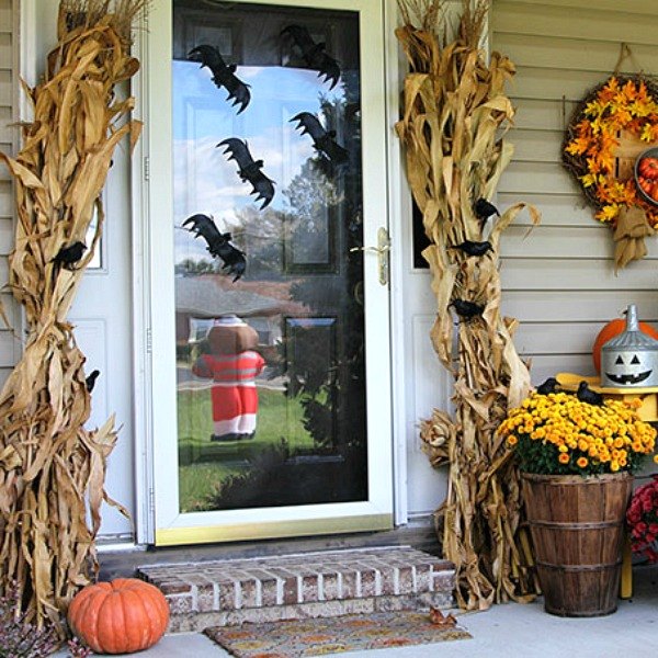 s these bloggers want to turn your home into a fall fantasy land, crafts, halloween decorations, home decor, seasonal holiday decor, thanksgiving decorations, Place Tall Corn Stalks by Your Front Door