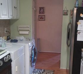 anyone have ideas for hiding a washer and dryer in a small kitchen