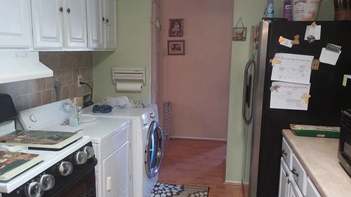 anyone have ideas for hiding a washer and dryer in a small kitchen