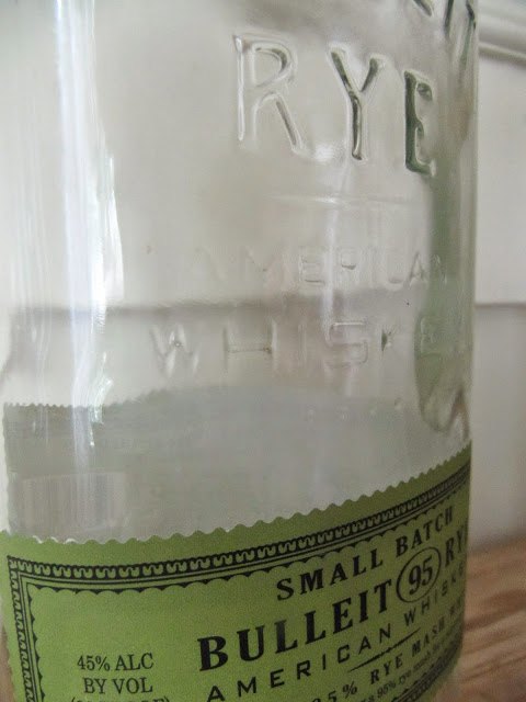 botella de aceite de whisky