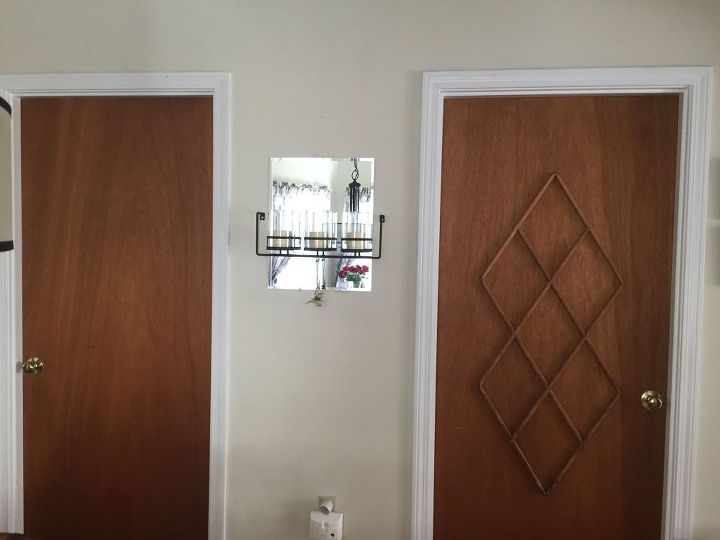 ugly slab door transformed with a mid century modern feel