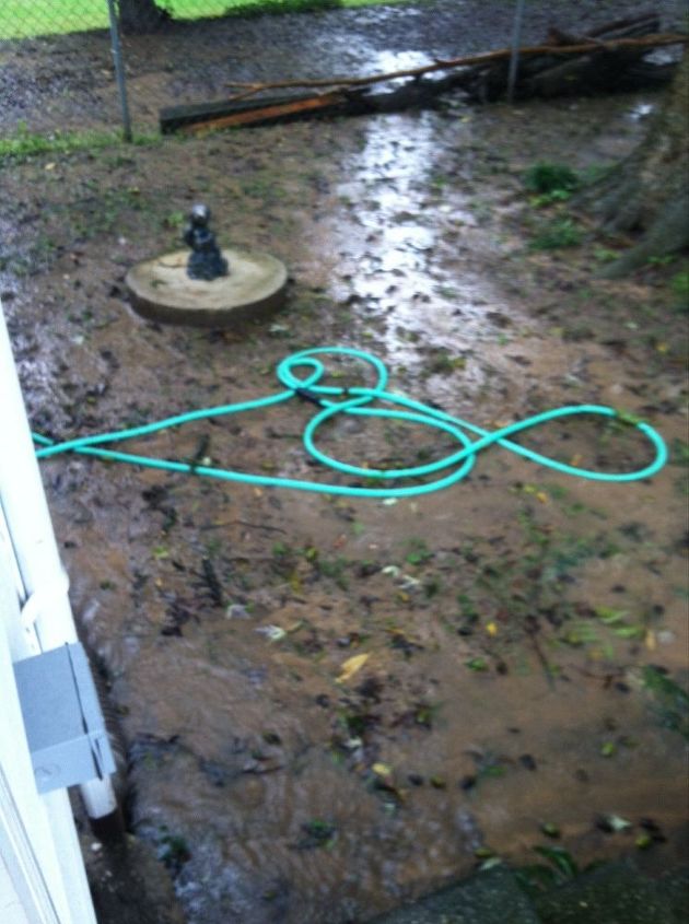 how to grow grass in a shady area, This is after a rain If I put anything over here it gets mud on it when it rains I would live to have money to build a deck over it