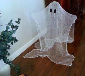 cute cheesecloth ghosts so easy, crafts, halloween decorations, I think this one looks like E T