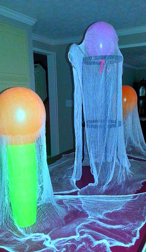 cute cheesecloth ghosts so easy, crafts, halloween decorations, These are plant stands on my kitchen counter