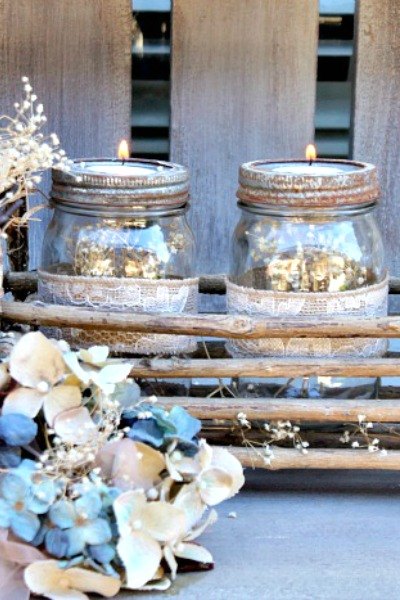 s the 10 most amazing mason jar ideas of the season, mason jars, seasonal holiday decor, Rusted Tea Light Lanterns
