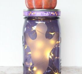 s the 10 most amazing mason jar ideas of the season, mason jars, seasonal holiday decor, Glowing Ghost Luminary