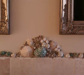 shells and pebbles brighten up a bathroom, bathroom ideas, wall decor