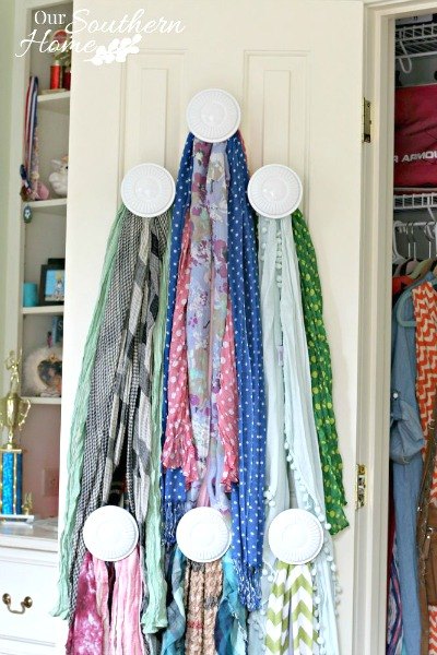 s 19 random thrift store finds become outrageously awesome decor, home decor, repurpose household items, repurposing upcycling, Valance Holders Become Scarf Storage After