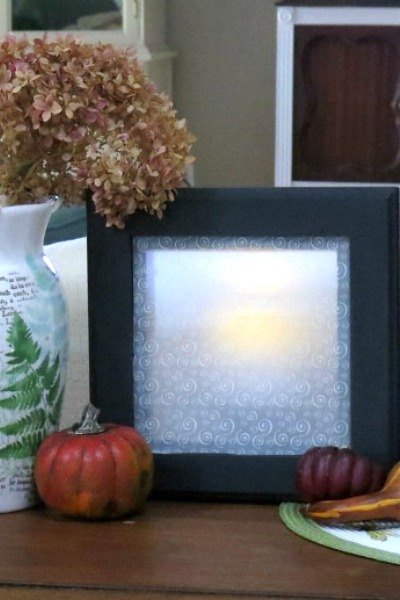 s 19 random thrift store finds become outrageously awesome decor, home decor, repurpose household items, repurposing upcycling, Framed Tiles Become Glowing Lanterns After