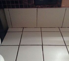 q covering a ceramic tile countertop, countertops
