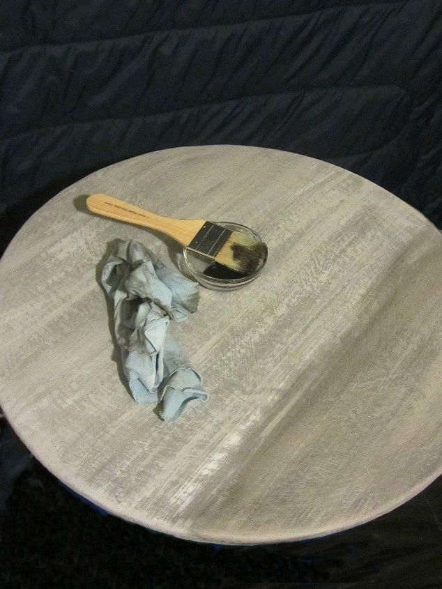 pedestal table with weathered finish