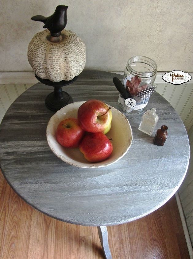 pedestal table with weathered finish