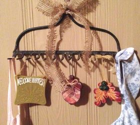 s from your community 10 inexpensive shortcuts to a better holiday home, home decor, home improvement, repurposing upcycling, Add storage to your entryway with an old rake
