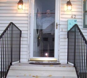 s from your community 10 inexpensive shortcuts to a better holiday home, home decor, home improvement, repurposing upcycling, Upgrade curb appeal with one pop of color