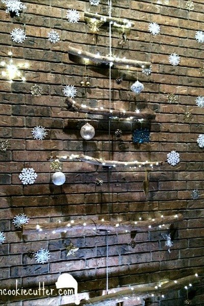 s 20 fake christmas trees you ll wish you d seen sooner, christmas decorations, repurposing upcycling, seasonal holiday decor, Hanging Branch Beauty