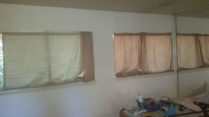 your opinion hanging these curtain rods flush to adjoining wall, Bad shadows but you see the whole right wall is mirrored