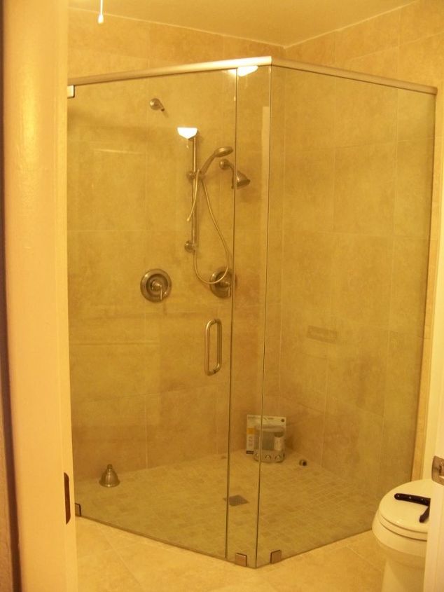 what is the best way to keep my glass shower doors clean, We put in a 36 inch wide door since this will be our last house we wanted to make it wheelchair accessible
