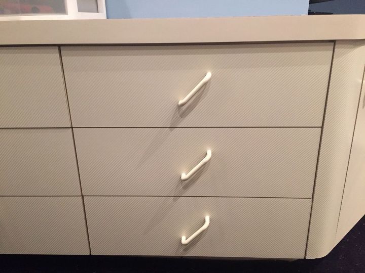 how to update built in formica furniture, These drawers wrap along the full side of the bedroom