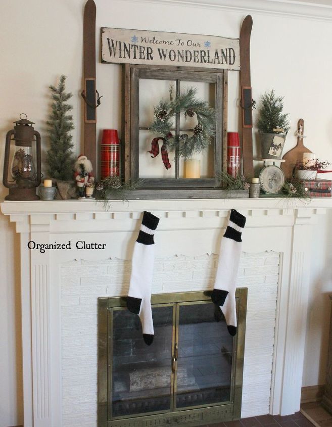 anchoring a christmas mantel with an old weathered window frame, christmas decorations, fireplaces mantels, seasonal holiday decor