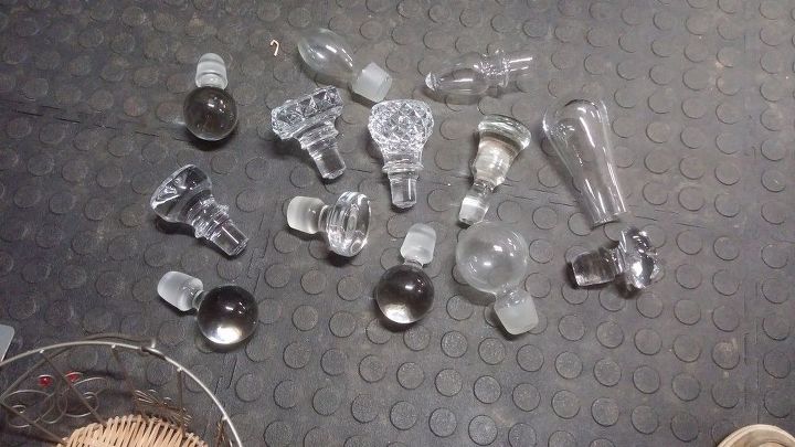 q what to do with glass bottlle stoppers, repurpose building materials, repurposing upcycling, Here they are and they are quite beautiful