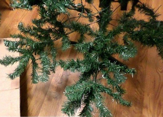 cheap christmas tree hack for bent and dented branches
