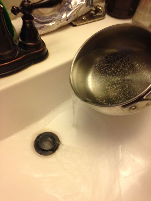 removing wax spill from inside the sink basin