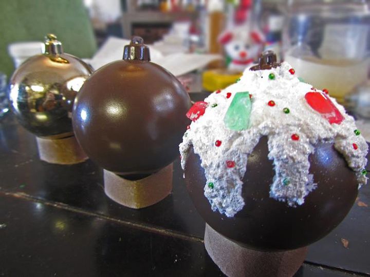 How to make – large, faux christmas candy decorations She pokes her ornaments through a piece of cardboard—look at her