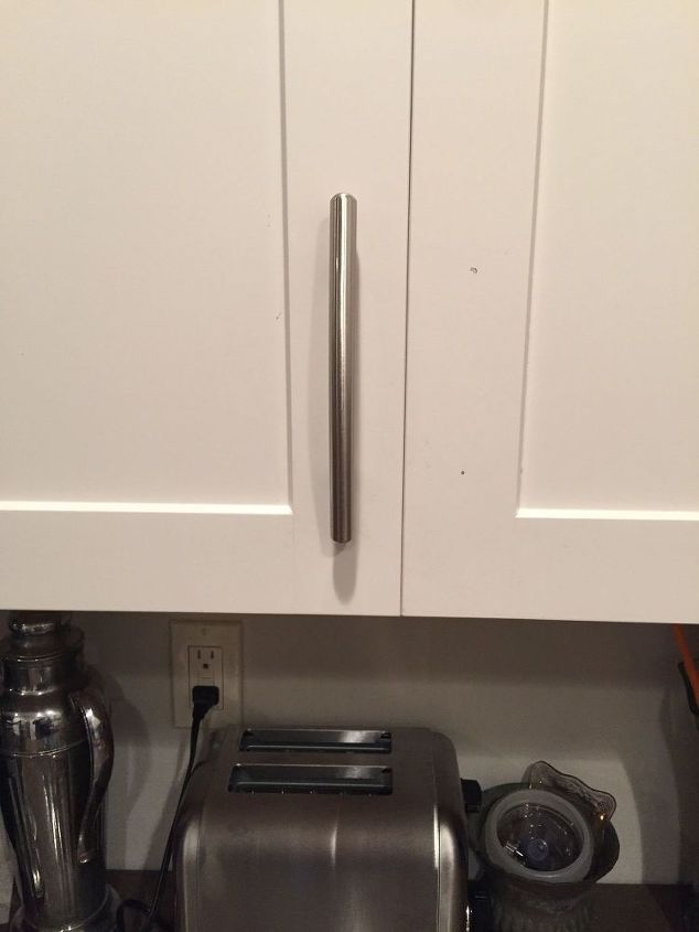 q cabinet handle placement urgent request he s doing it now, home decor, home decor dilemma, kitchen cabinets, kitchen design, Bottom of handle is below the top of the horizontal frame on the cabinet