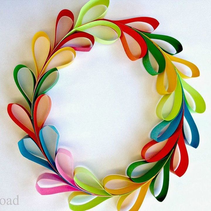 s 13 insanely creative things to do with last year s calendar, crafts, Fold Strips into a Colorful Wreath