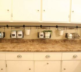 s 17 brilliant ways to declutter every countertop in your home, countertops, home decor, organizing, storage ideas, Keep kitchen countertops clean with baskets