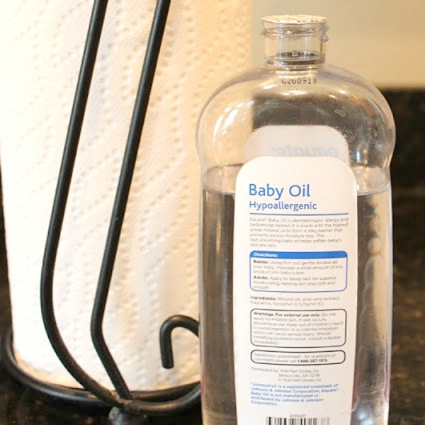 s 10 tiny changes to cut your cleaning routine in half, cleaning tips, Wipe greasy surfaces with baby oil first