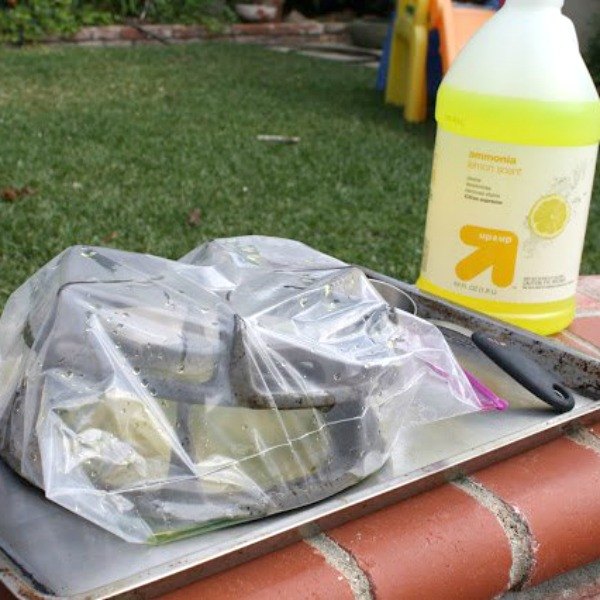 s 10 tiny changes to cut your cleaning routine in half, cleaning tips, Clean stove grates with plastic gallon bags