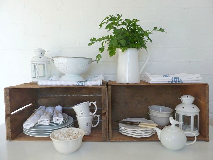 s 23 insanely clever ways to eliminate clutter, organizing, storage ideas, Hang Wooden Crates for Spacious Shelves