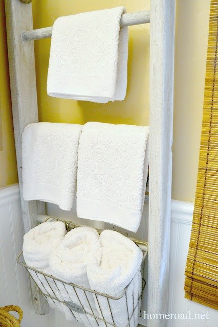 s 23 insanely clever ways to eliminate clutter, organizing, storage ideas, Organize Towels on a Ladder