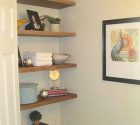 s 23 insanely clever ways to eliminate clutter, organizing, storage ideas, Put Shelves Above Your Toilet