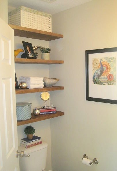s 23 insanely clever ways to eliminate clutter, organizing, storage ideas, Put Shelves Above Your Toilet