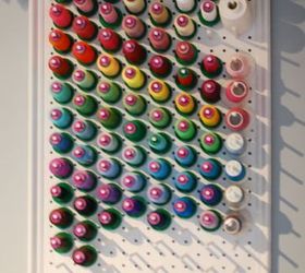 s 23 insanely clever ways to eliminate clutter, organizing, storage ideas, Store Spools with Pegboard Wood Dowels