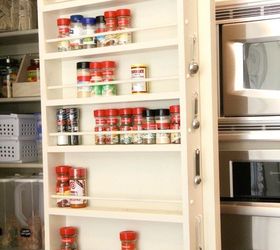 s 23 insanely clever ways to eliminate clutter, organizing, storage ideas, Put a Spice Rack on Your Pantry Door