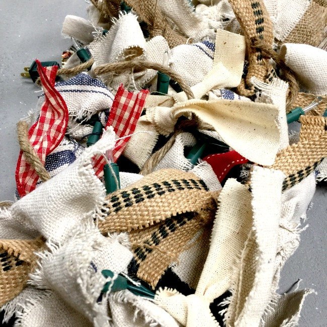 s 14 string light ideas that are cozier than your bed, bedroom ideas, lighting, Rustic Scrap Garland