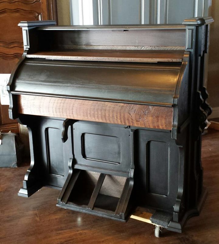 1800 s eastlake pump organ repurposed into a wine bar