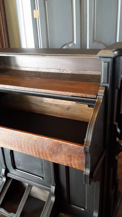 1800 s eastlake pump organ repurposed into a wine bar