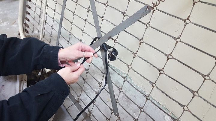 1940 s metal army cot turned light fixture