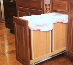 s 14 space saving storage ideas that ll make your house feel much bigger, storage ideas, Tuck the trash cans away