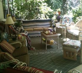 my indoor outdoor space, decks, outdoor furniture, outdoor living, Furnished with vintage stuff mom s iron set the couch we bought in yes the early 1960 s and of course a newer wicker set Love having the outdoors in