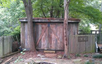 This is a picture of an 8 x 16ft shed I constructed out of old barnwood. Notice the rusted tin on the roof.