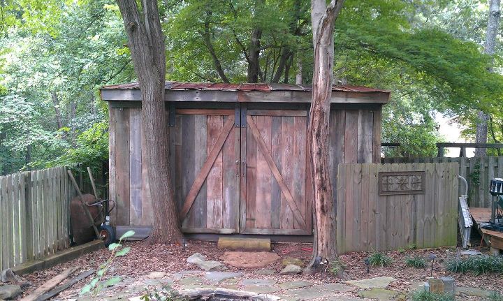 this is a picture of an 8 x 16ft shed i constructed out of old barnwood notice the, repurposing upcycling, roofing, woodworking projects, Barnwood Shed