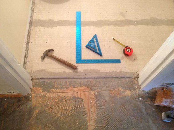 bathroom floor tile prep work that s crucial for a gorgeous look, bathroom ideas, flooring, tile flooring, tiling, The right prep for tile floors is simple and straight forward Use a level hammer drill deck screws leveling compound to help with the process