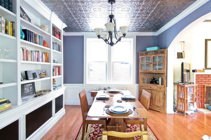 fun dining room makeover with a tin ceiling, dining room ideas, home decor, home improvement, tiling, The bookcase was actually installed in front of a radiator shared with the adjacent room so we had to seal the inside wood and use foam insulation to protect the casework The black screen is radiator screen