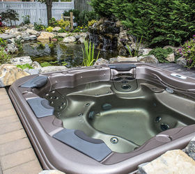 project spotlight love water features love to relax this is the best of both enjoy, outdoor living, patio, ponds water features, pool designs, spas, Bullfrog spa with jet paks overlooks the pond and waterfall
