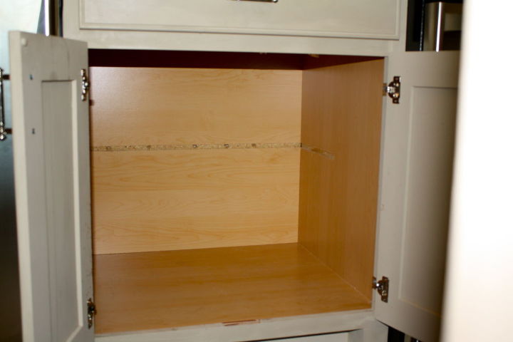 making a kitchen cabinet more functional, kitchen cabinets, shelving ideas, First he removed the shelf